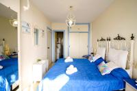Postel nebo postele na pokoji v ubytování Suitur apartamento frente a la playa fuengirola