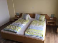 Een bed of bedden in een kamer bij Gasthof Wadl