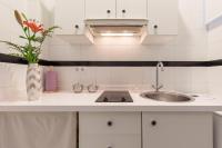 Kuchyň nebo kuchyňský kout v ubytování Precioso Apartamento Sevilla Centro