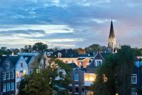 a view of a city with a church at Hotel Espresso in Amsterdam