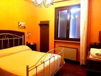 Posteľ alebo postele v izbe v ubytovaní Hotel Villa Elisabetta
