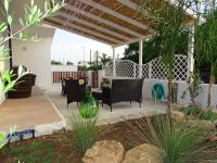 A garden outside Linda Casa Vacanze