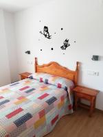Postel nebo postele na pokoji v ubytování Live Salou Apartment