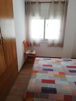 Postel nebo postele na pokoji v ubytování Live Salou Apartment