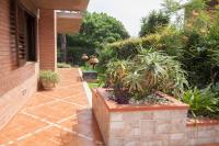 A garden outside B&B Villa Carmen