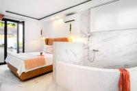 Postel nebo postele na pokoji v ubytování Villa D'Oro - Luxury Villas & Suites