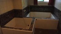 a bathroom with a sink and a counter top at Li Tang in Baihe