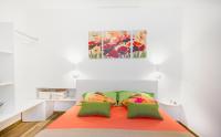 A bed or beds in a room at Marechiaro House