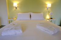 Posteľ alebo postele v izbe v ubytovaní agreli holiday house