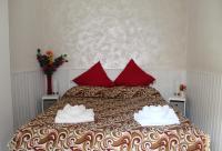 A bed or beds in a room at La Luna nel Parco