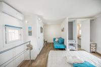 A bed or beds in a room at Marechiaro House