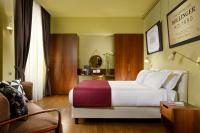 Posteľ alebo postele v izbe v ubytovaní Hotel De' Ricci - Small Luxury Hotels of the World