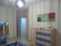 A bed or beds in a room at Linda Casa Vacanze