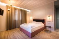 Posteľ alebo postele v izbe v ubytovaní Allure Central Boutique Hotel