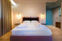Posteľ alebo postele v izbe v ubytovaní Allure Central Boutique Hotel