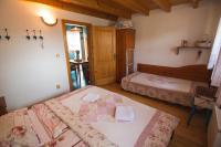 A bed or beds in a room at Aquapark Tatralandia chatka 118