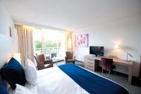 Ein Bett oder Betten in einem Zimmer der Unterkunft Sanadome Hotel & Spa Nijmegen