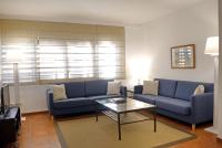 A seating area at Apartaments Beach & Golf Resort