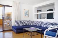 A seating area at Apartaments Beach & Golf Resort