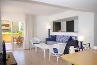 A seating area at Apartaments Beach & Golf Resort