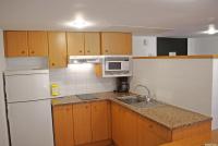 A kitchen or kitchenette at Apartaments Beach & Golf Resort