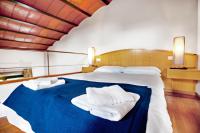 Postel nebo postele na pokoji v ubytování Galligants Apartment