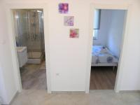 Postel nebo postele na pokoji v ubytování Apartman Danijel