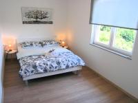 Postel nebo postele na pokoji v ubytování Apartman Danijel