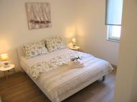 Postel nebo postele na pokoji v ubytování Apartman Danijel