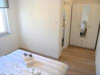 Postel nebo postele na pokoji v ubytování Apartman Danijel