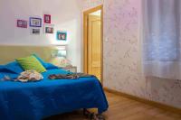 A bed or beds in a room at Balenax Pensión