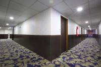a corridor of a hospital with a corridorngthngthngthngthngthngth at Chiayi Crown Hotel in Chiayi City
