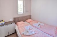Posteľ alebo postele v izbe v ubytovaní Villa Oliver 3 Siófok
