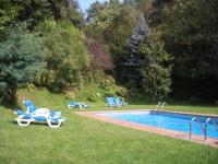 Bazén v ubytování Hostal de la Gloria nebo v jeho okolí