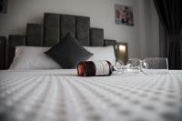 A bed or beds in a room at Amalia Rooms Sea View