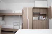 A bed or beds in a room at Amalia Rooms Sea View