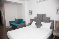 A bed or beds in a room at Amalia Rooms Sea View