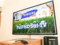 ホテル ビルケンホフにあるテレビまたはエンターテインメントセンター