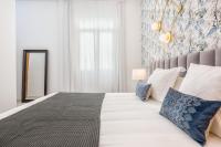 Posteľ alebo postele v izbe v ubytovaní iloftmalaga Premium Alameda Principal