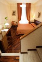 Łóżko lub łóżka w pokoju w obiekcie Hotel Torino