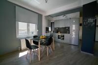 Kuchyňa alebo kuchynka v ubytovaní V&V Central & Elegant Apartment