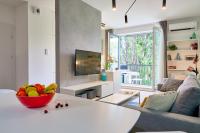 Televízia a/alebo spoločenská miestnosť v ubytovaní Mojito Apartments - Botanica II