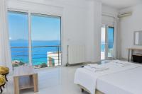 Posteľ alebo postele v izbe v ubytovaní Verga Villas Resort