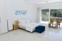Posteľ alebo postele v izbe v ubytovaní Verga Villas Resort