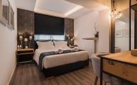 Posteľ alebo postele v izbe v ubytovaní Acropolis Luxury Living