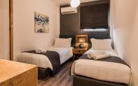 Posteľ alebo postele v izbe v ubytovaní Acropolis Luxury Living