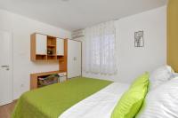 Postel nebo postele na pokoji v ubytování Sun&Sea 4 stars apartment