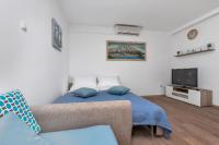 TV a/nebo společenská místnost v ubytování Sun&Sea 4 stars apartment