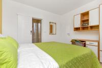 Postel nebo postele na pokoji v ubytování Sun&Sea 4 stars apartment