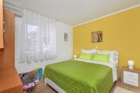 Postel nebo postele na pokoji v ubytování Sun&Sea 4 stars apartment